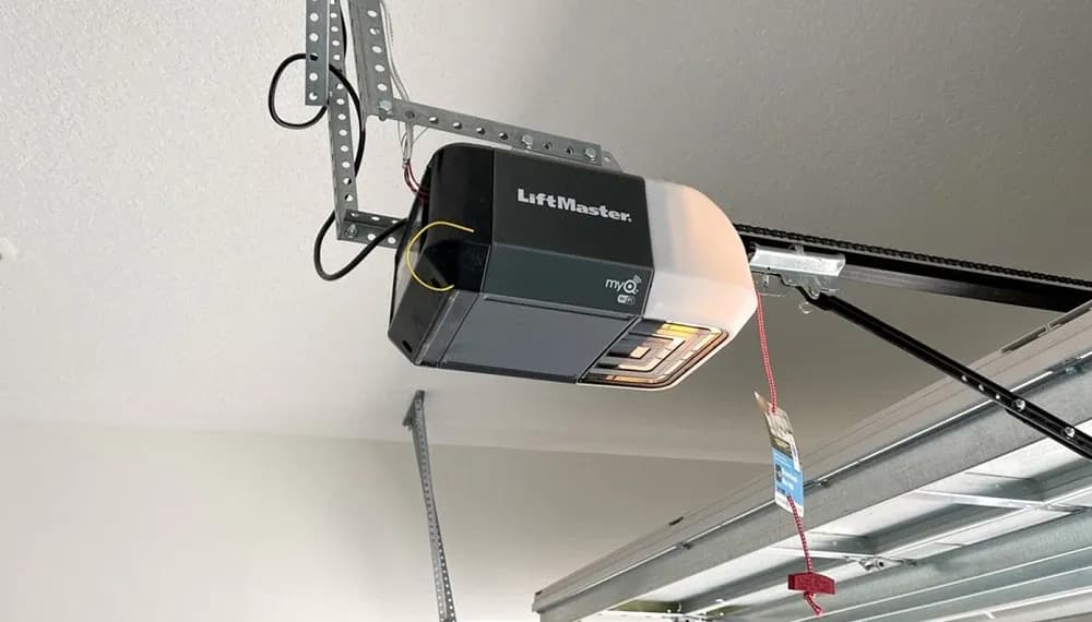 Industrial garage door operator mounted at the ceiling